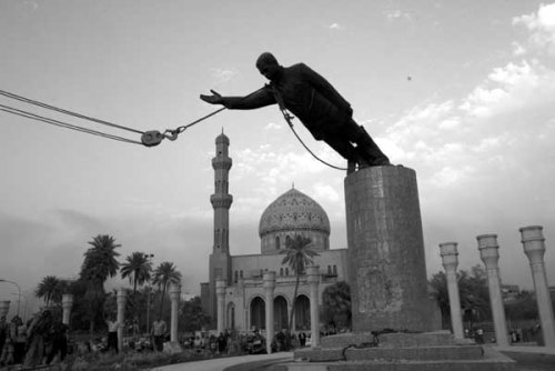 A STATUE OF PRESIDENT SADDAM HUSSEIN FALLS IN CENTRAL BAGHDAD